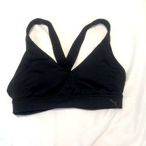 This is a black medium size sports bra!